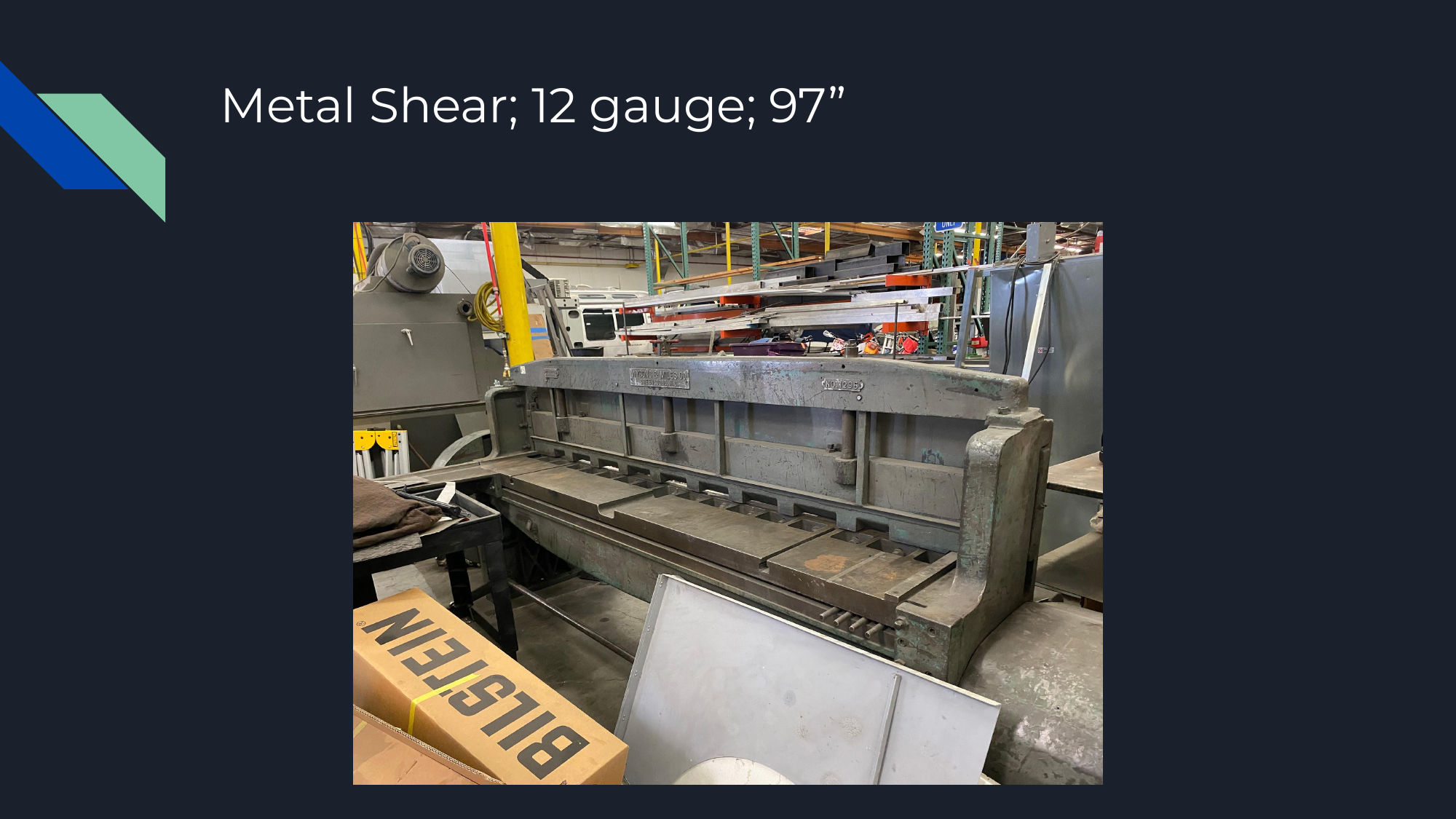 97-inch metal shear cutting sheet metal to size at metal fab shop