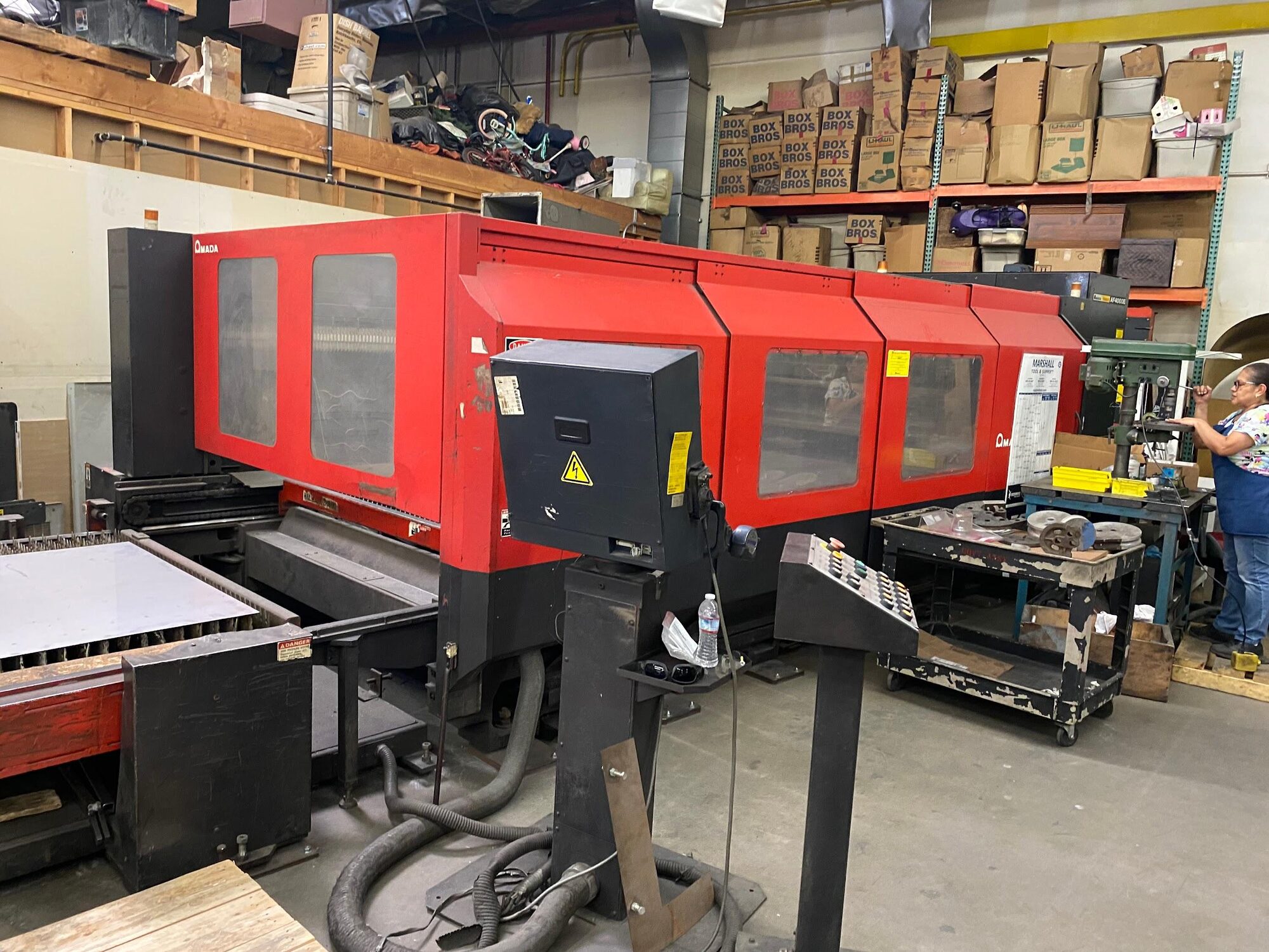 The 4,000-watt Amada laser cutting metal on the floor at Ambor-Palomino Metal Fab in Simi Valley